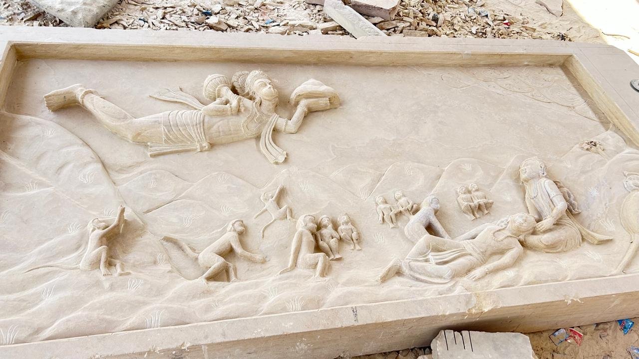 sandstone wall panel depicting Ramayana Hanuman mythological marble carving for temple walls
