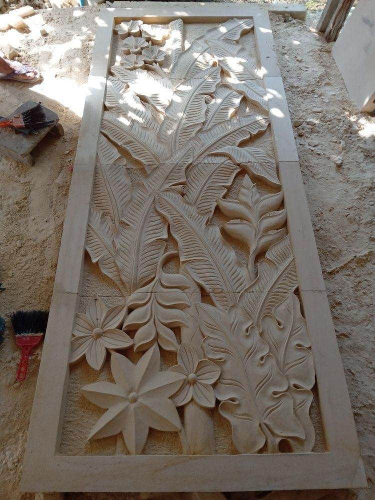 Sandstone wall panel with tropical leaf and floral carving for decorative feature walls